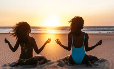 vacancesguadeloupe__content-black-woman-on-tropical-beach-at-sunset-2026-03-09-08-14-51-utc