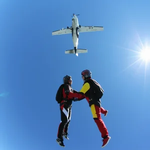 vacancesguadeloupe__female-skydivers-free-falling-above-leutkirch-bav-2026-03-11-00-56-49-utc